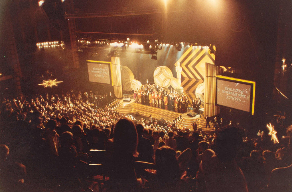 Glitzy awards event stage and attendees