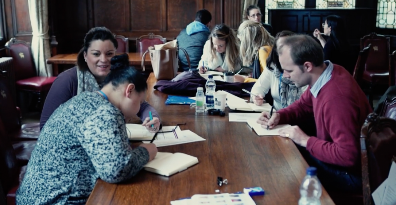 Group of students taking notes in lecture